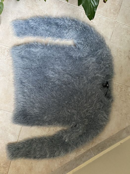 Стилни и елегантни пуловери H&M