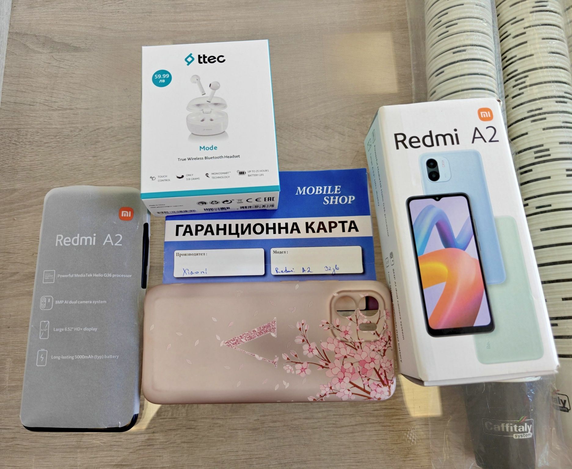 Xiaomi Redmi A2 + подаръци - кейс и слушалки.