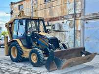 Buldoexcavator Cat / Caterpillar 428D