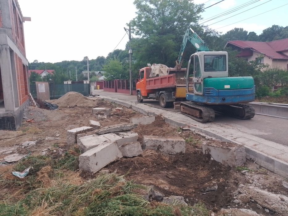 Evacuez Transport Excavator Buldoexcavator De Închiriat