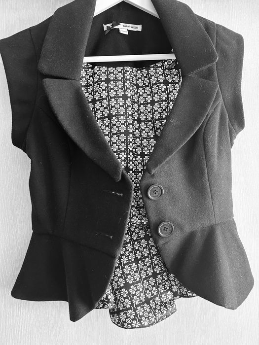 Елегантен изчистен елек