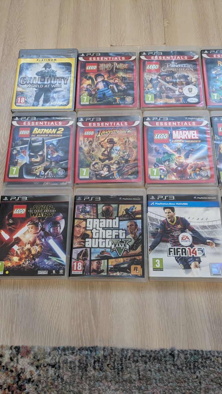 PS3 slim + 2 controllere + 18 DVD jocuri
