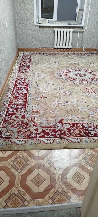 ковер бывший в употреблении