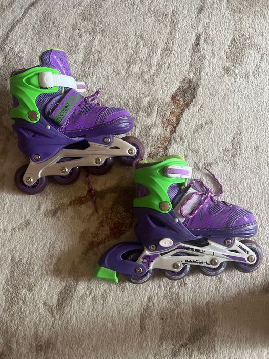 Роликовые коньки