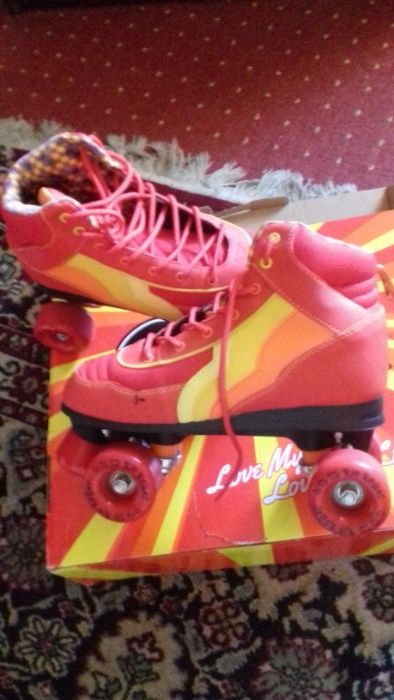 Vand patine cu rotile+protectii Rio Roller (marimea 40.5-noi) Unisex.