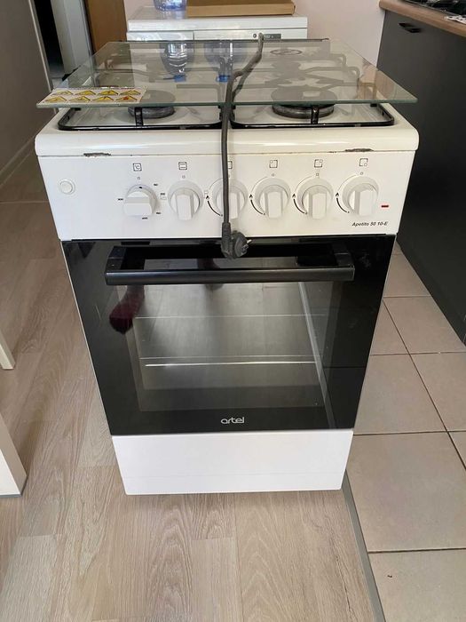 Продам газ плиту, с электро духовкой, автоподжиг