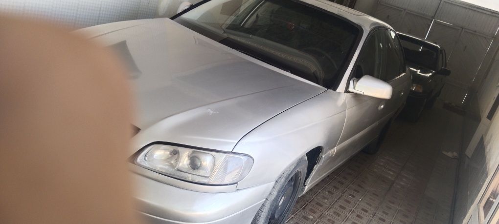 Opel omega holati ōrta yurib turgan moshin