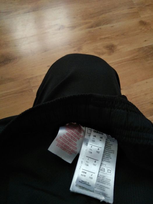 Pantaloni de trening Adidas Manchester United mărime 11-12 ani