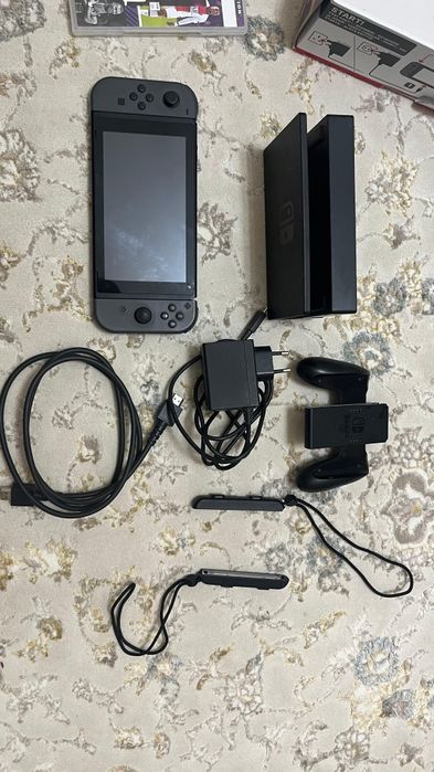 Продам игровую приставку Nintendo switch, с играми, в отличном состоян