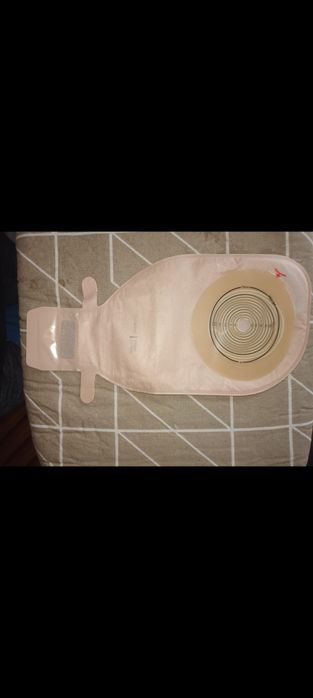 Pungi colostoma cu evacuare