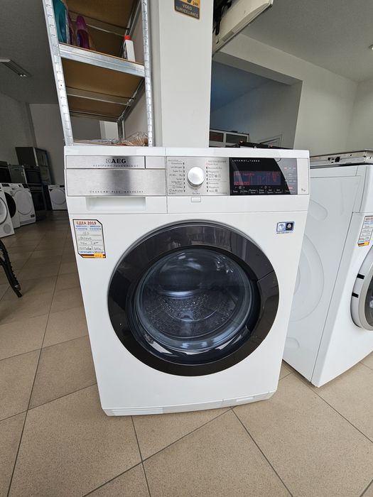 Пералня със сушилня с термопомпа AEG