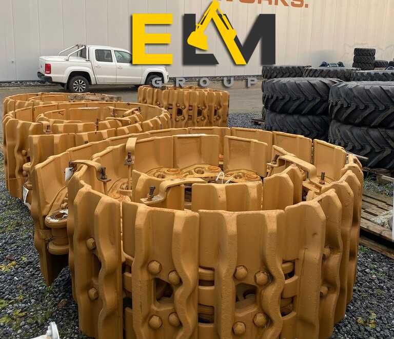Гусеницы, звездочки, траки, катки верхние ленивец JCB Cat Komatsu