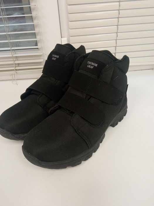 Продам новые зимние ботинки