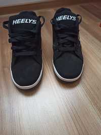 Vând heelys mărimea 39