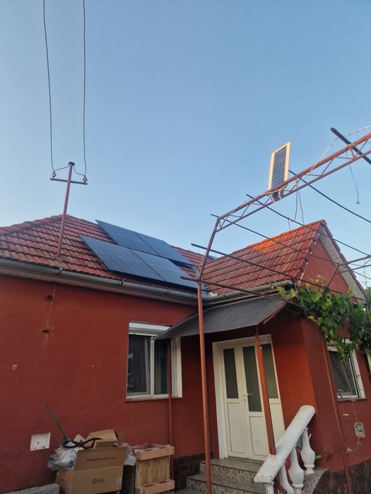 Casa la tara de vanzare