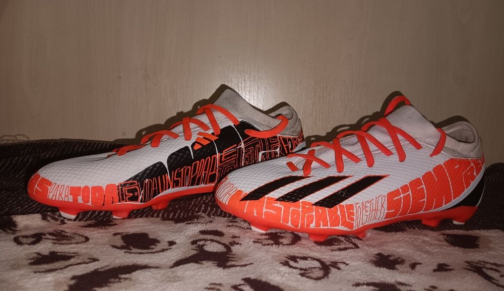 Ghete pentru fotbal X Speedportal Messi.3 Fg J GW8391 Alb