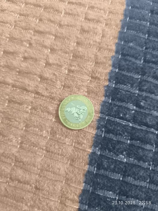 100 тенге " Крылатый барс"