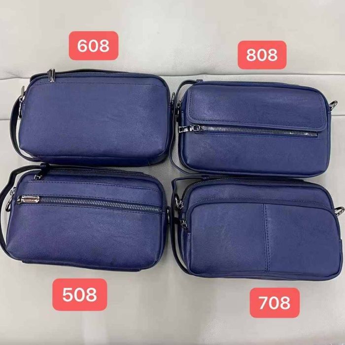 Универсальная мужская сумка барсетка - многосекционная.