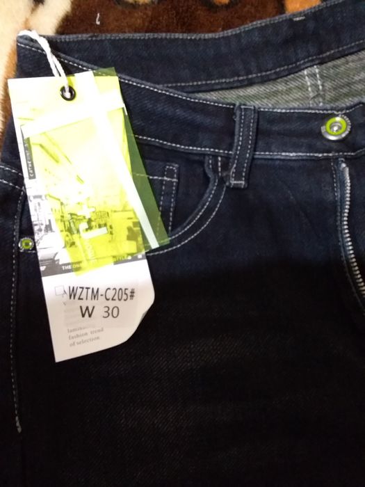 Джинсы новые ,продаю за 100000