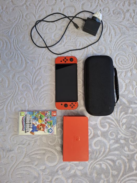 Nintendo Switch Oled ediție limitata mario +joc+bonus 2 manete
