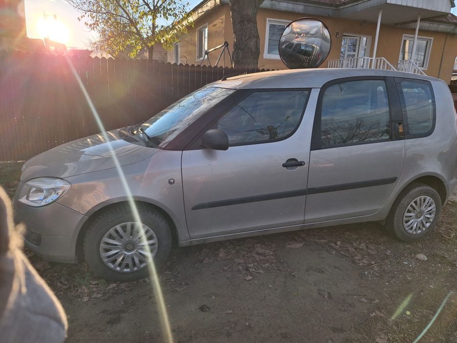 Vând skoda roomster