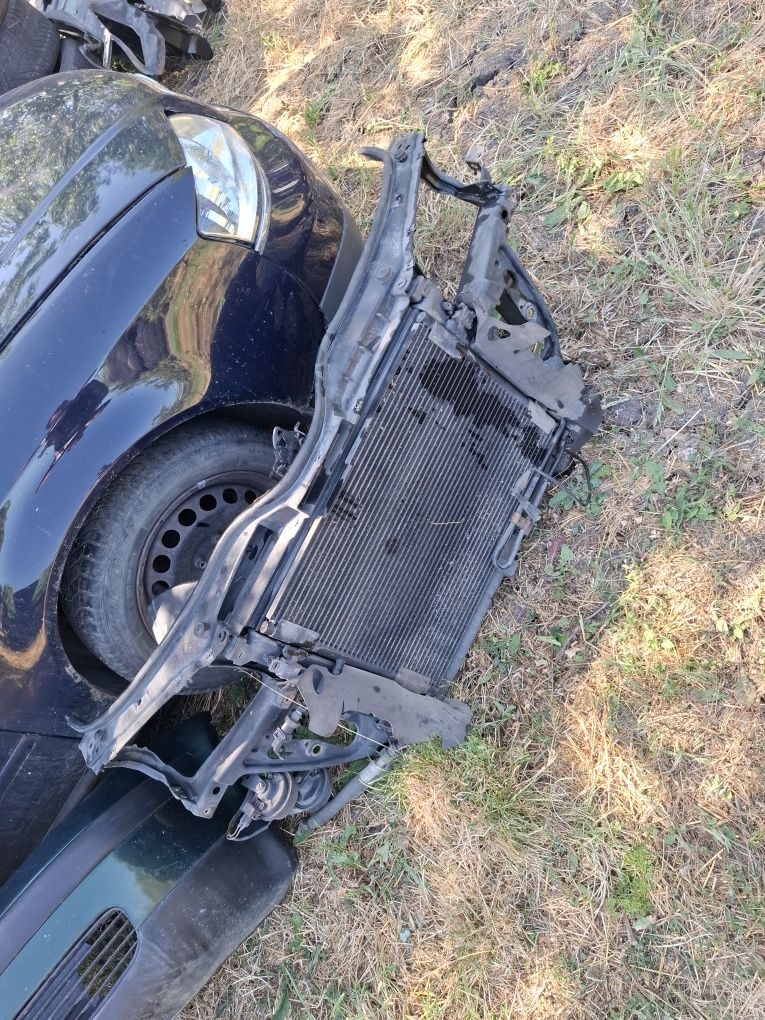Vand bara fata trgagher radiatoare faruri vw passat b5 an 1997