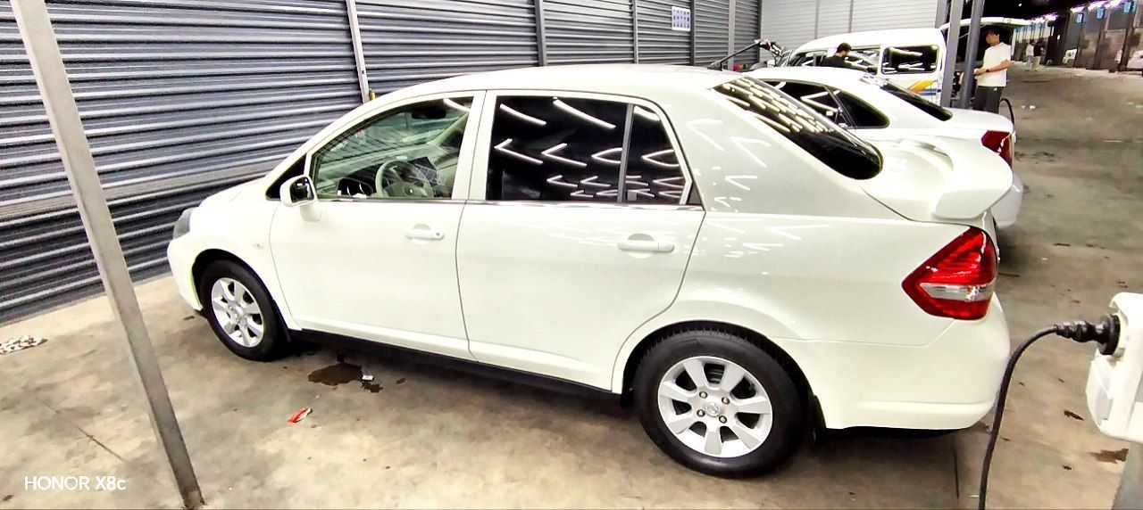 Nissan tiida 1.8 2008 йил холати идеалний