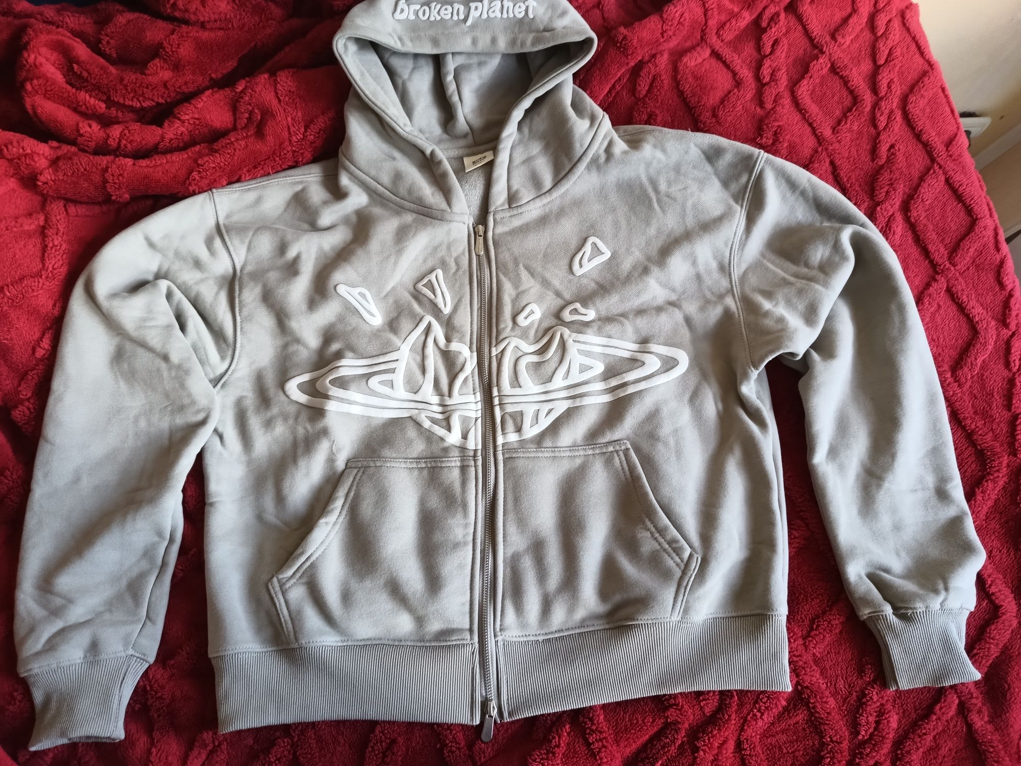 Broken planet zip up