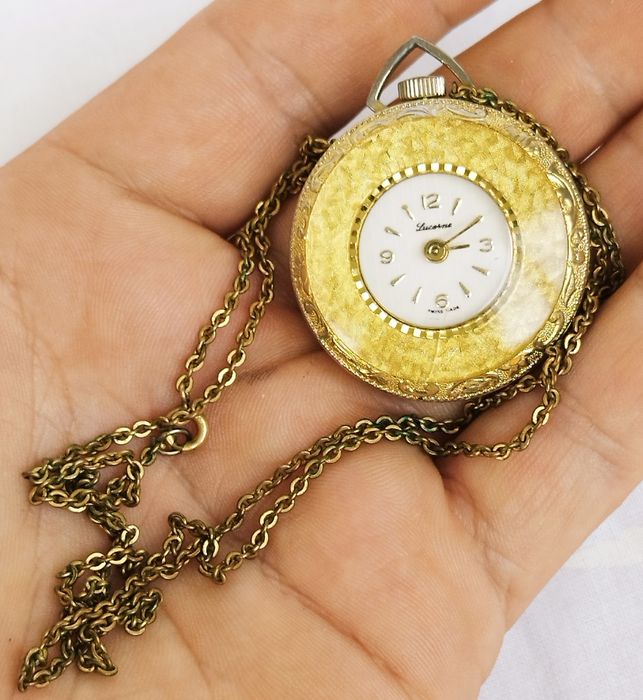 Ceas damă mecanic Lucerne, pandantiv cu lanț, un rubin, placat cu aur