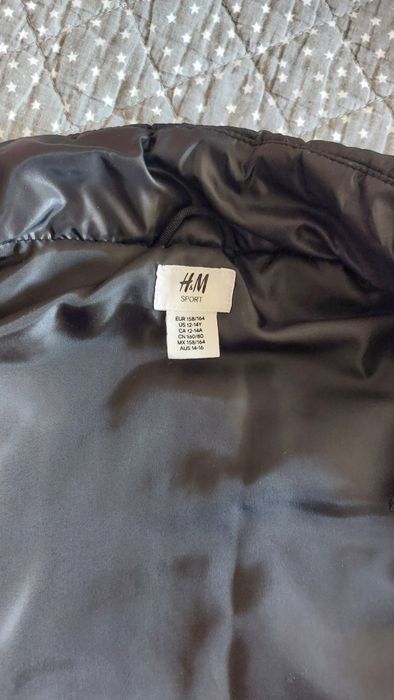 Черен елек,без ръкави,неразличим от нов.158-164.Рамо-36см,дълж.-60см..