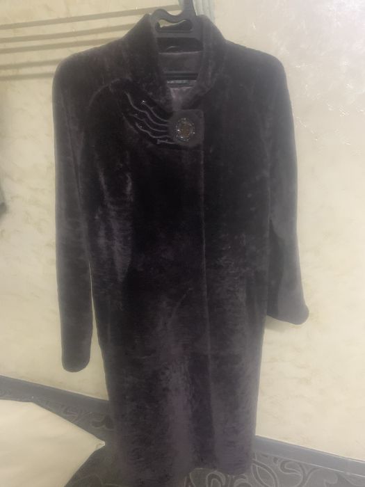 Продается пальто утепленное