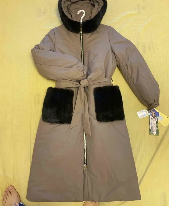 Продается зимний пуховик. Новый.
