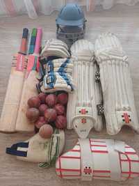Cricket kit: 2x bats, 1x pads, 1x helmet, 2x gloves, 11 balls (USED)