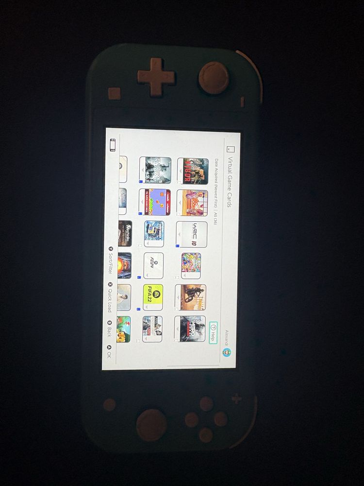 Nintendo switch lite+card 64gb