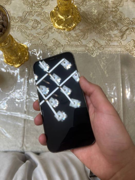 ayfon 12pro xolati ideal aybi yoq