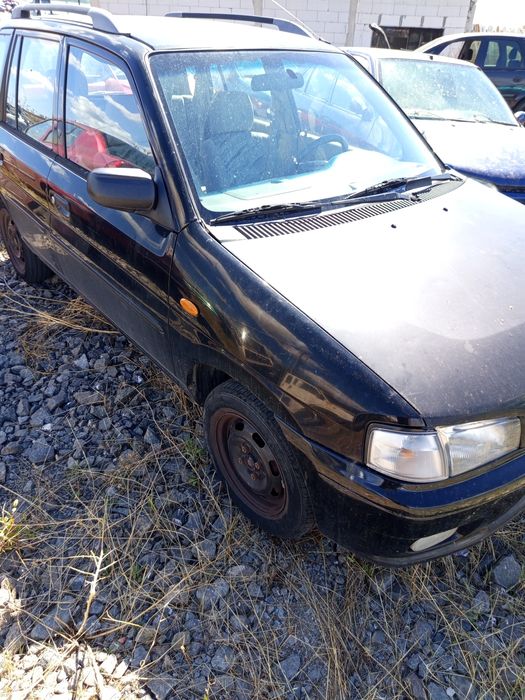 Мазда Демио бензин