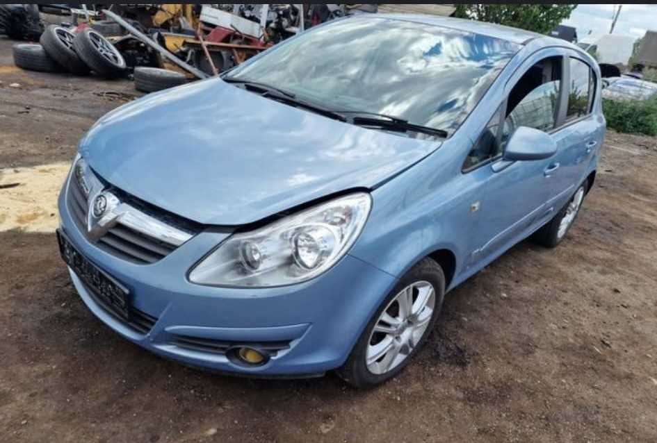 Dezmembrez Opel Corsa D motor cutie usa stop far radiator injector