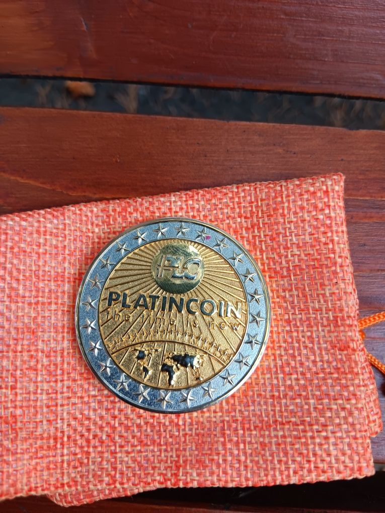 Монета Platincoin