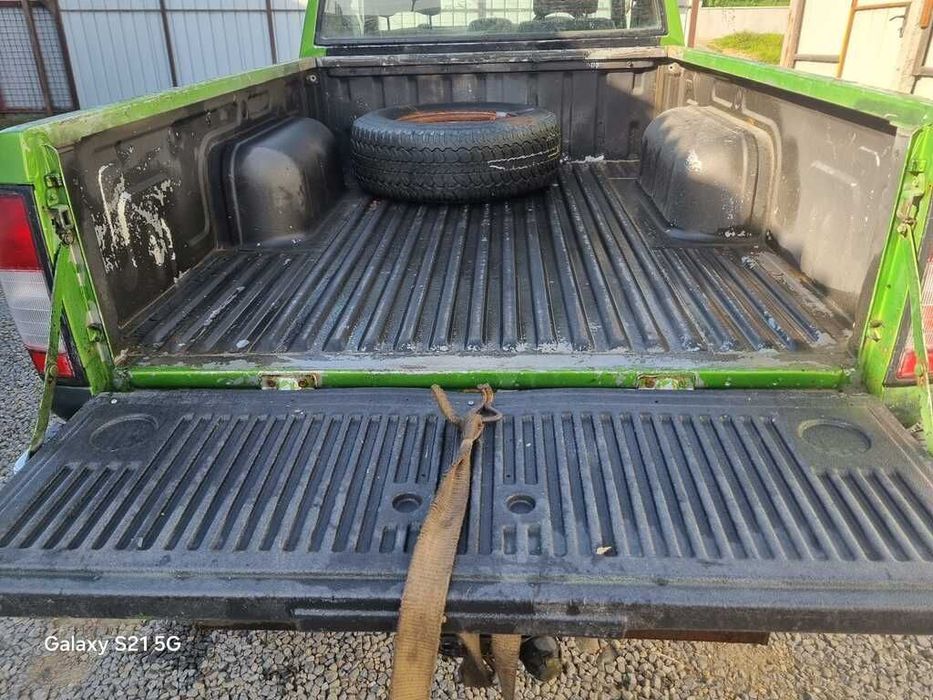 Bena Nissan Navara D22 1998 - 2004 Verde (1347)