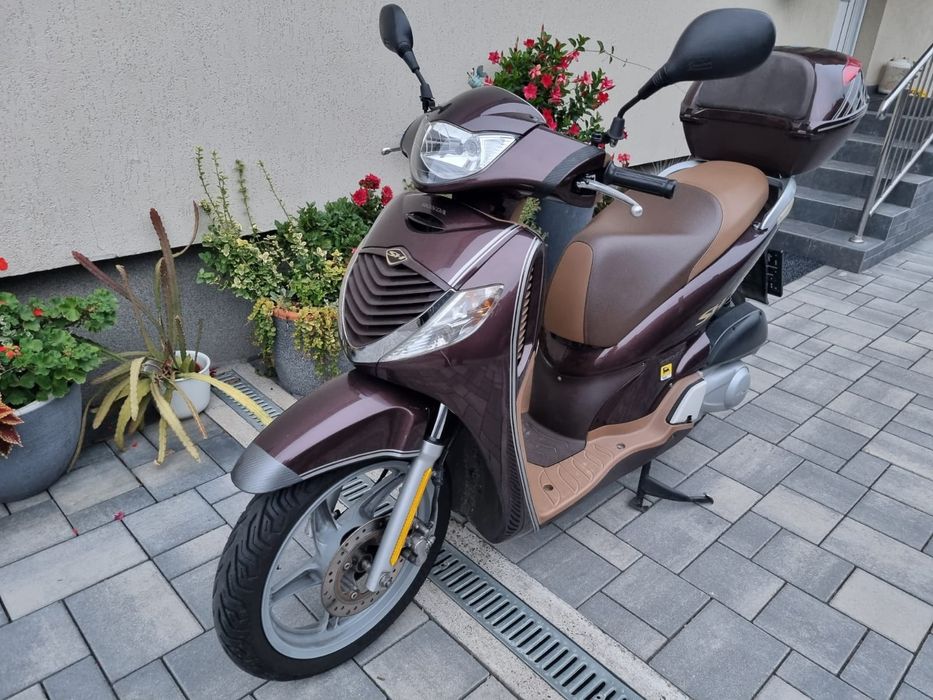 Honda SH 125 i injectie,se conduce cu B