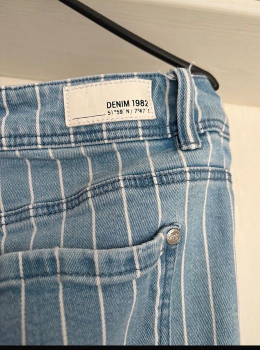 Blugi elastici de dama cu dungi