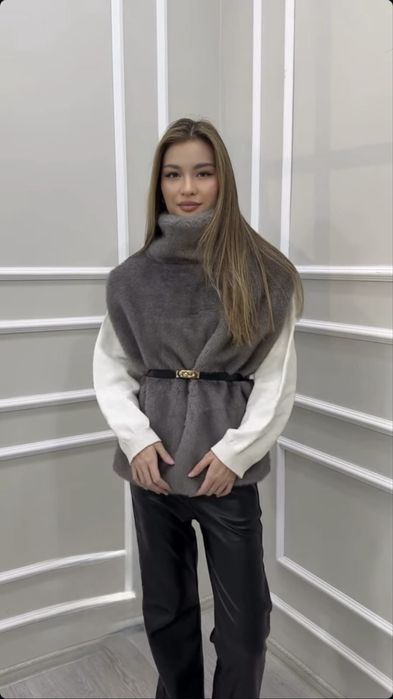 Меховые жилетки.