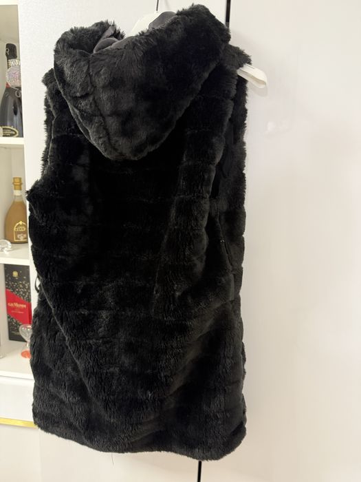 Vesta de blana .