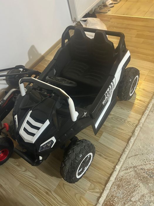 Buggy electric 4x4 pentru copii, 2 locuri, scaune piele, Bluetooth