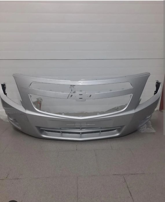 Бампер передний Кобальт серебристый оригинал