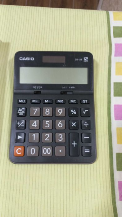 Калькулятор Casio новый