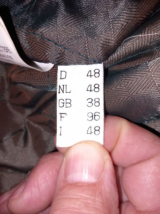 Кожен елек с много джобове