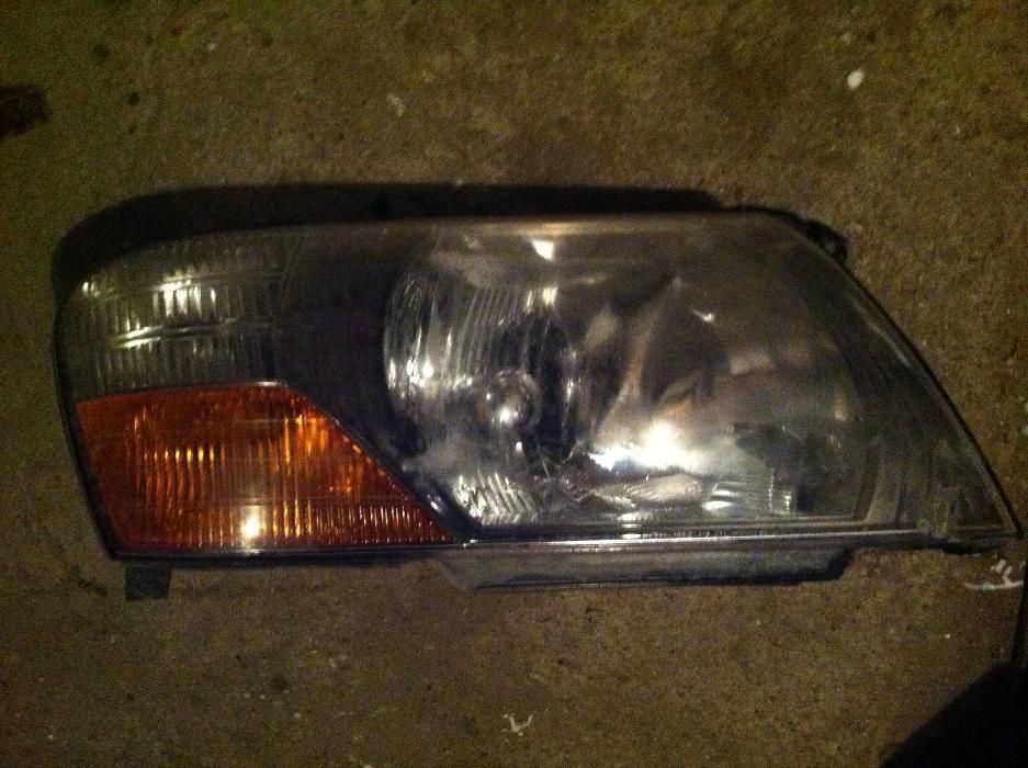 Передняя фара правая (ОРИГИНАЛ) на Паджеро MITSUBISHI PAJERO