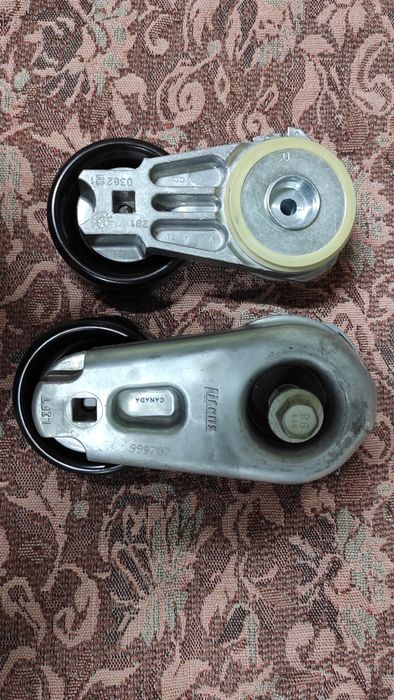 Натяжитель натяжной ролик механизм Мазда Форд