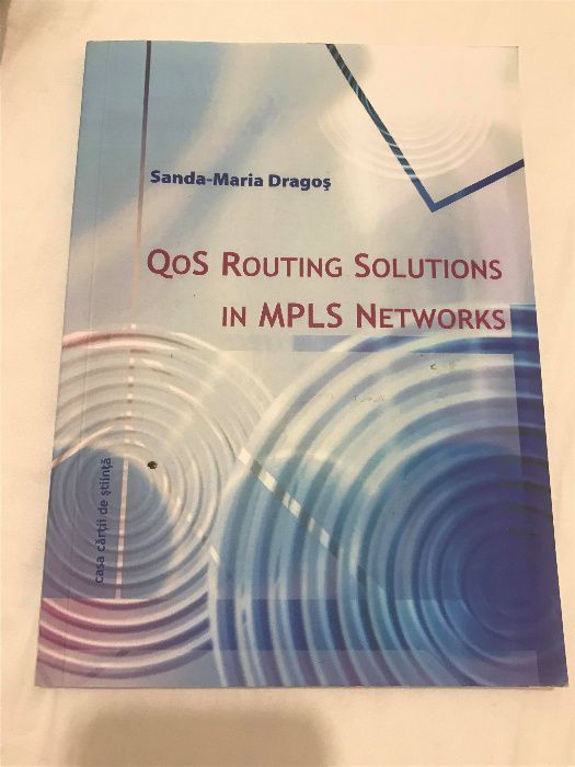 QoS Routing Solutions in MPLS Networks